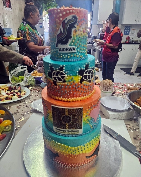 A 4 tier cake decorated with Aboriginal art