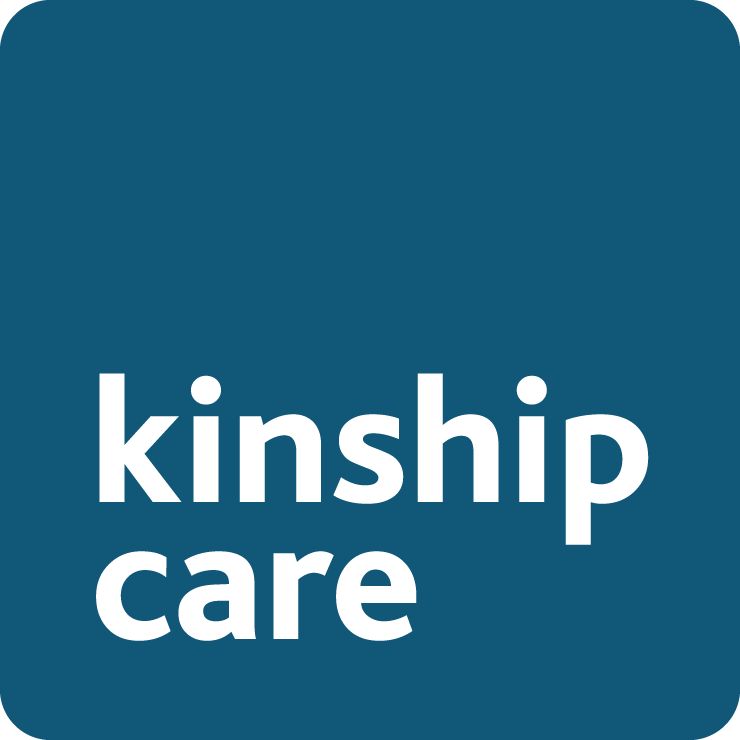 white letters kinship care on dark blue background